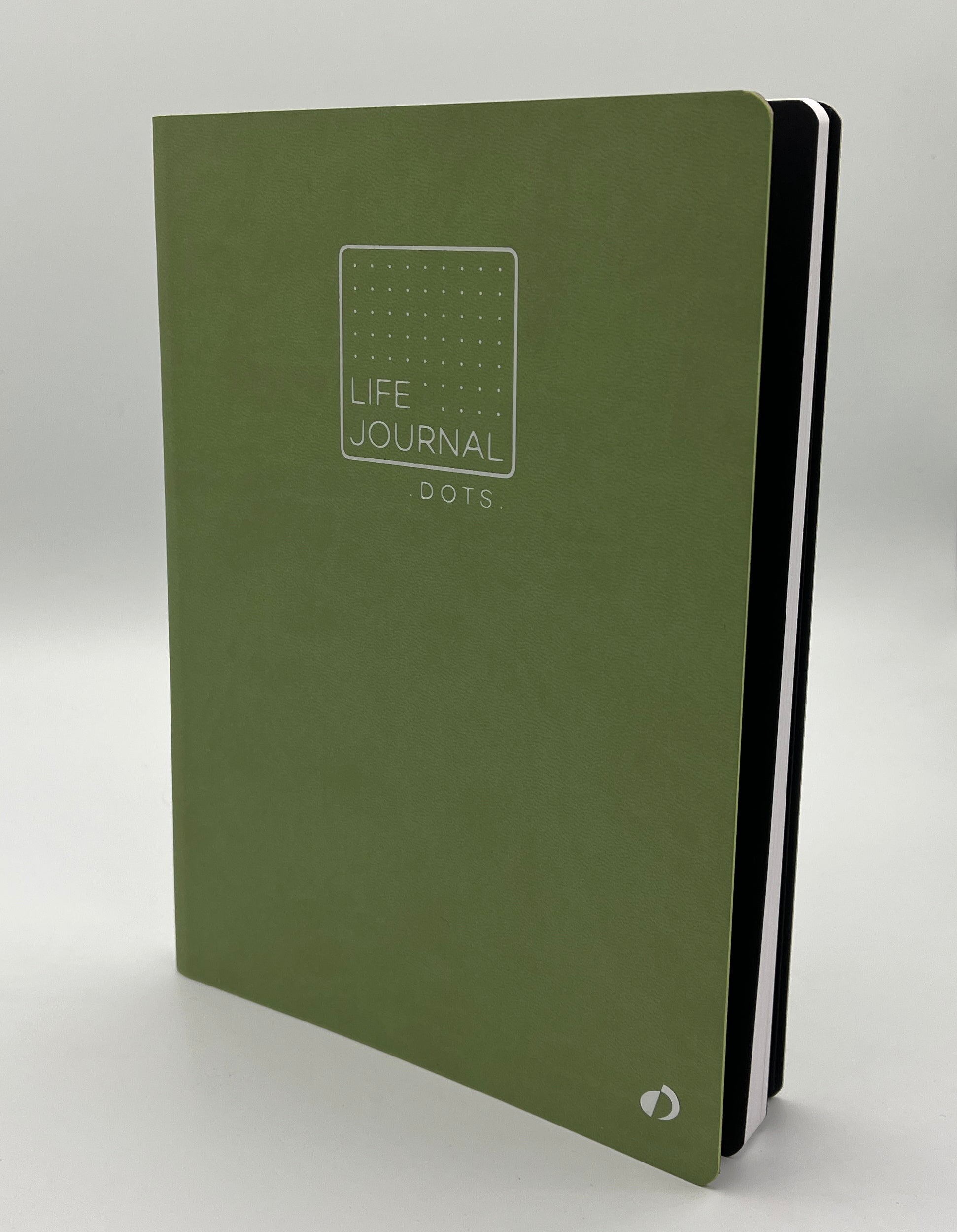 Green life journal with 'Dots' on a gray background