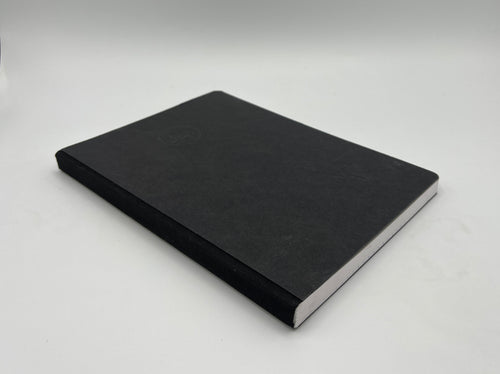 Black notebook on a light gray background