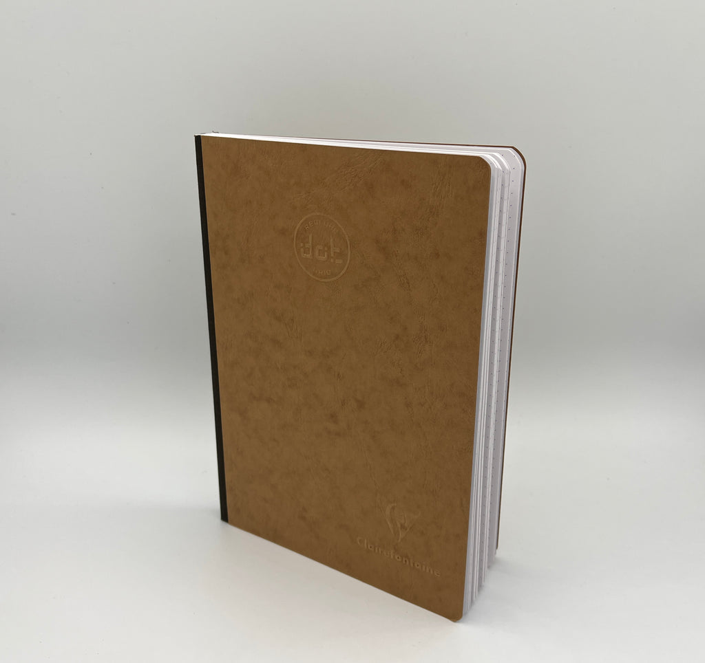Brown notebook with a visible brand logo on a white background