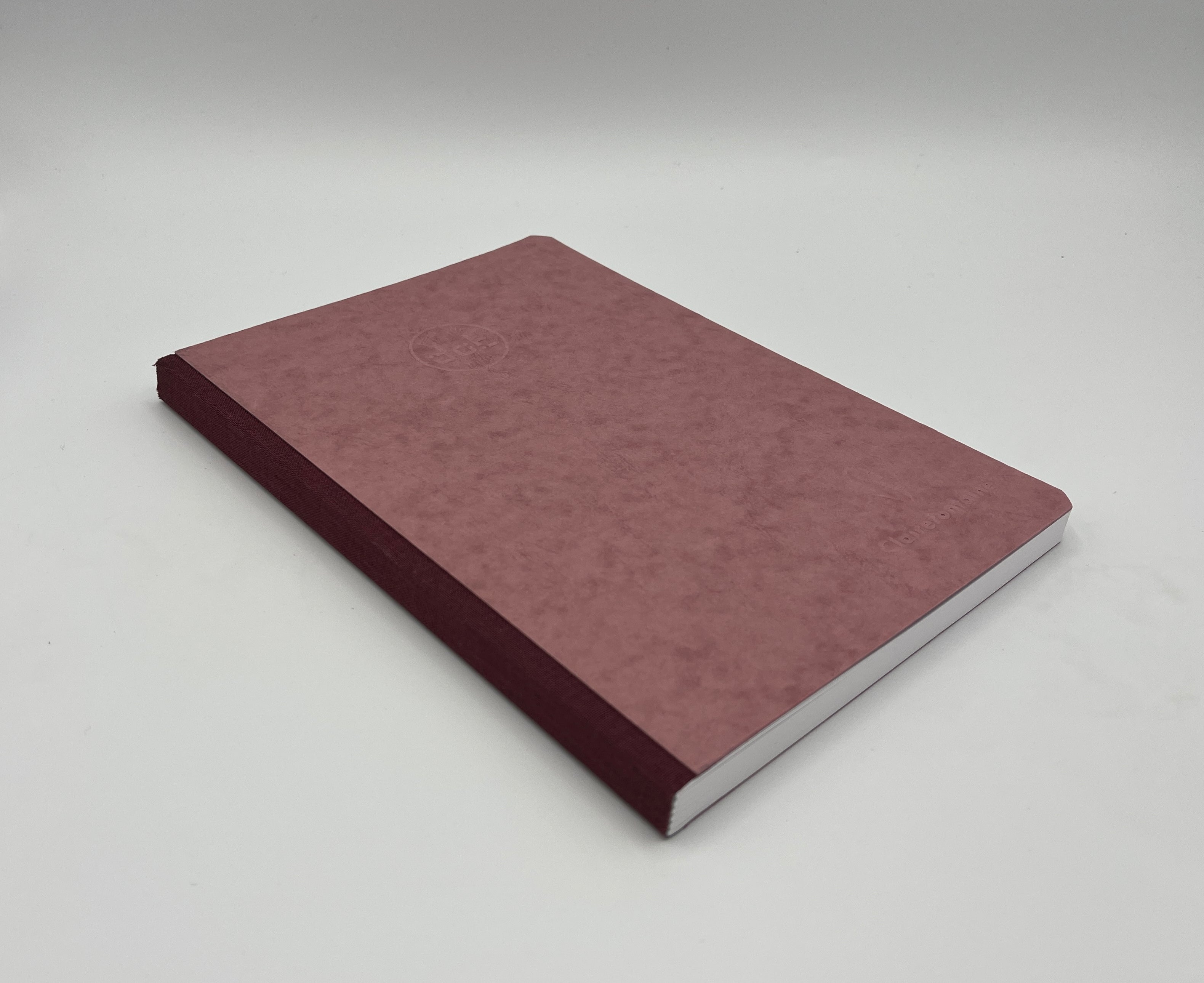 Brown book on a gray background