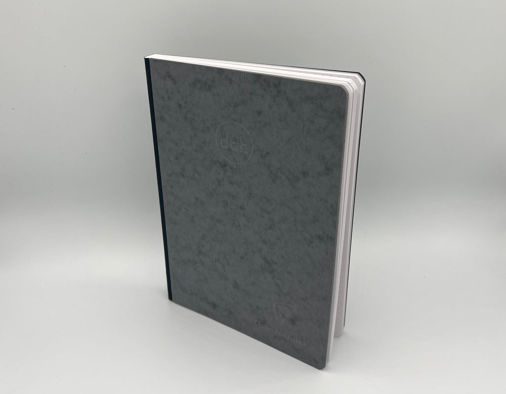 Gray notebook on a light gray background